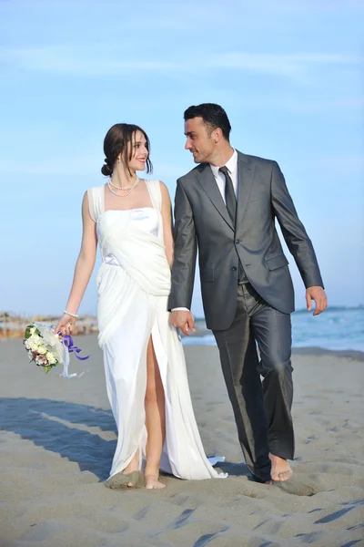 Romantic beach wedding at sunset Stock Picture