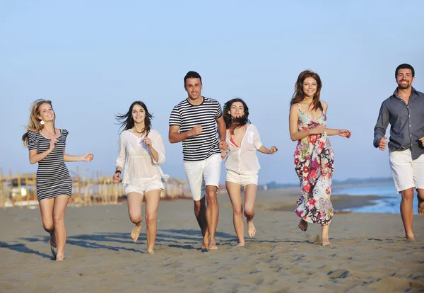 Happy young group have fun on beach — Stock Photo, Image