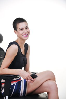 esmer kadın model iş sandalye üzerinde poz