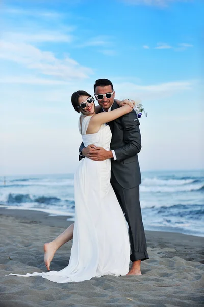 Svatba romantická pláž při západu slunce — Stock fotografie