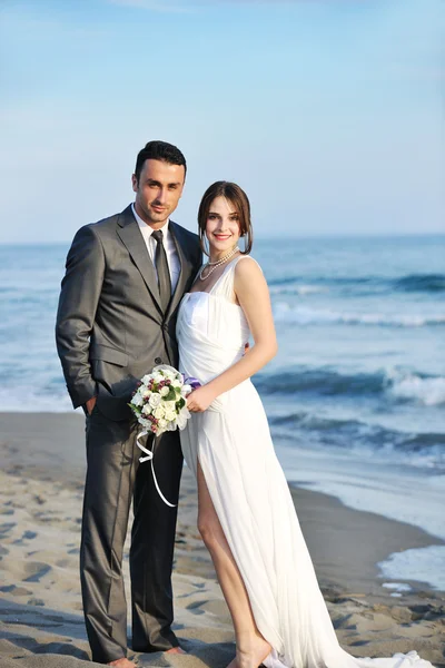 Romantic beach wedding at sunset Stock Image