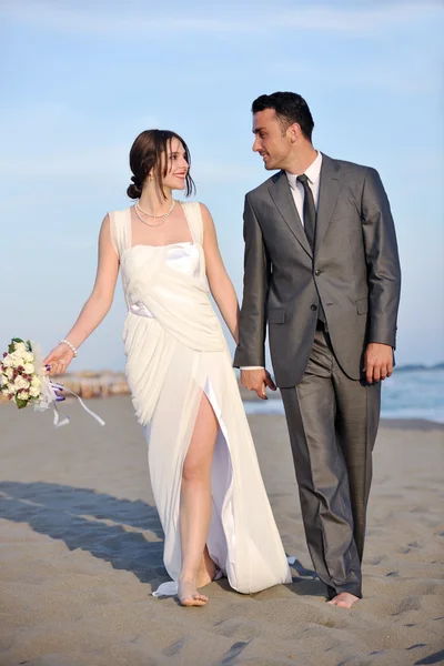 Romantic beach wedding at sunset Stock Picture