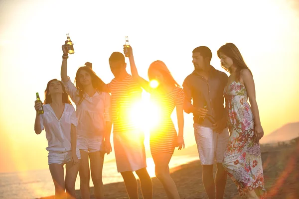 Happy young group have fun on beach — Stock Photo, Image