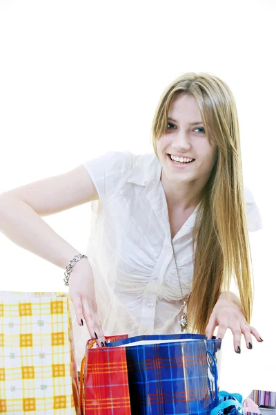 Mutlu genç yetişkin kadın ile renkli çanta alışveriş — Stok fotoğraf