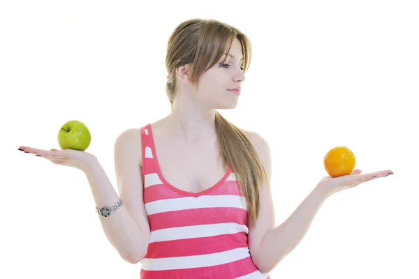 Glad ung kvinna äta äpple isolerad på vit — ストック写真