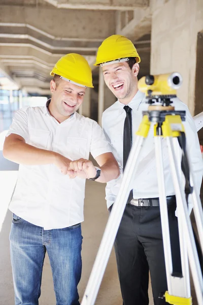 Team of architects on construciton site — Stock Photo, Image
