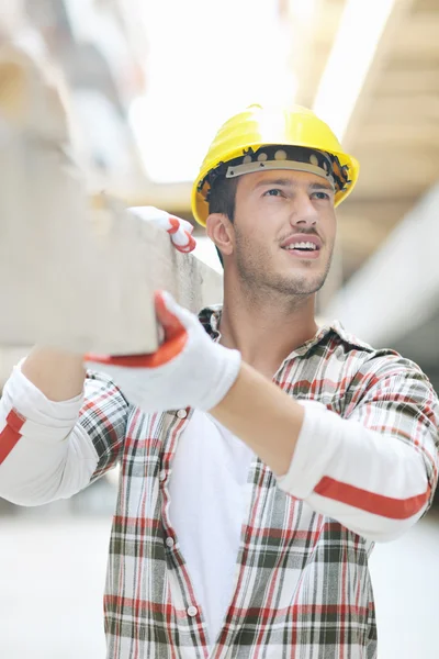Hard worker on construction site — Stock Photo, Image