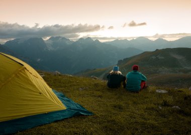 Couple camping at night clipart