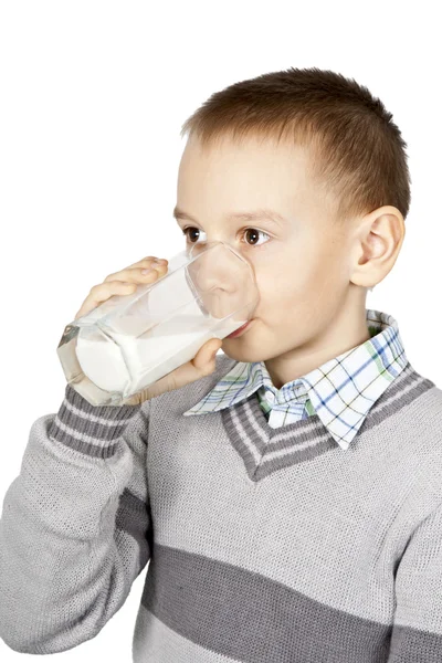 Boy drinks milk. — Stock Photo, Image