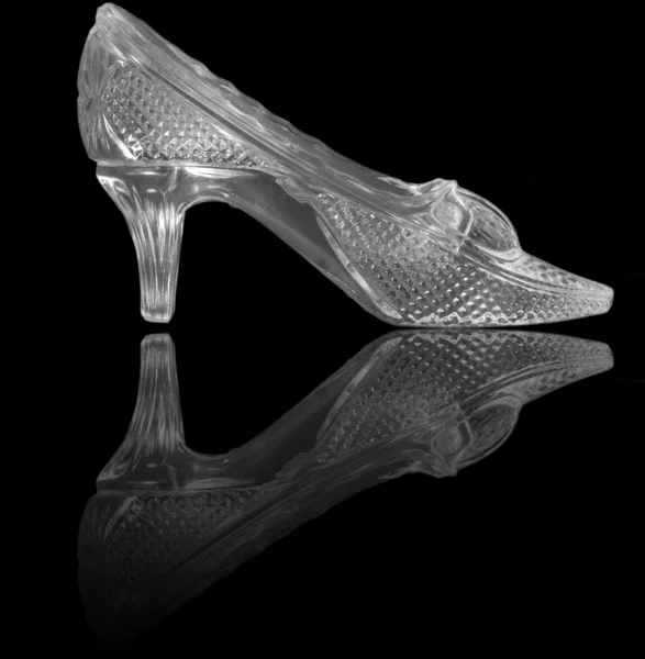 stock image Woman glass shoe on black