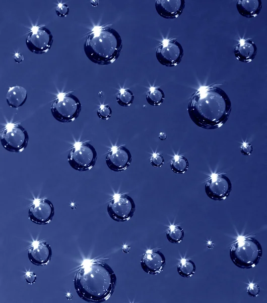 Dark blue drops with stars — Stock Photo, Image