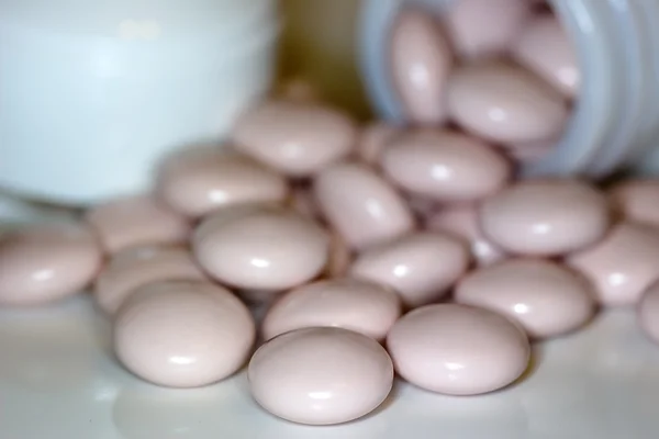 Un sacco di pillole rosa — Foto Stock