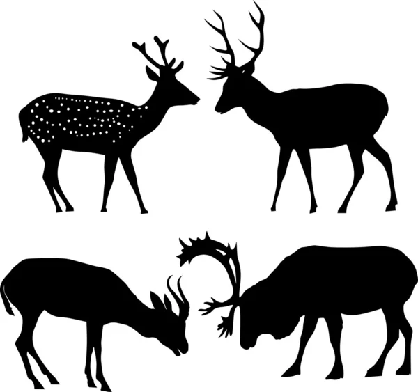 Four deer silhouettes — Stock Vector