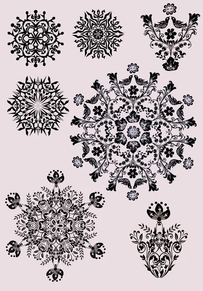 Black snowflakes collection on pink — Stock Vector