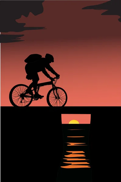 Fietser silhouet en zonsondergang — Stockvector
