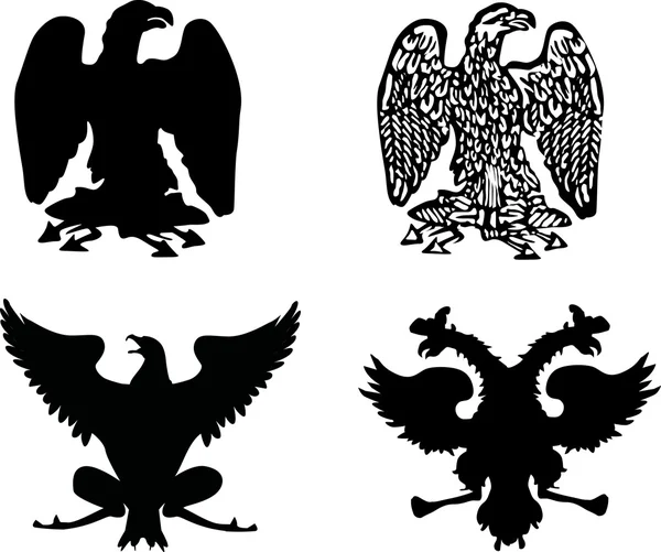 Four heraldic eagles — Stock Vector