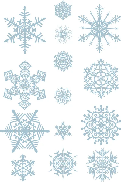 Grands et petits flocons de neige bleus — Image vectorielle