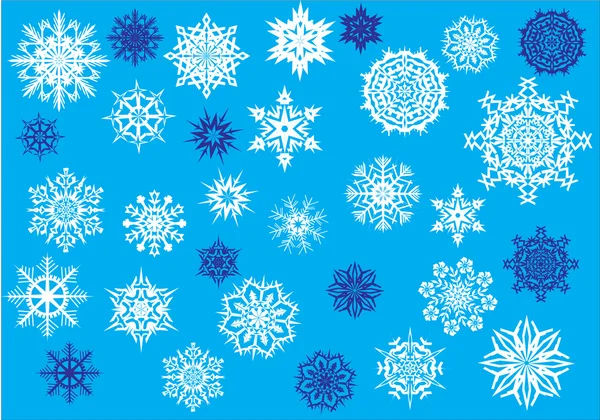 Colección de copos de nieve blanco y azul — Archivo Imágenes Vectoriales