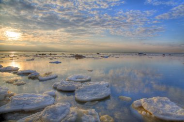 Ice-floes under sunset clipart