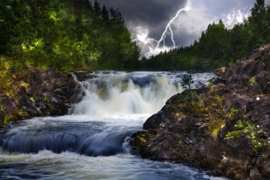 Waterfall with lightning clipart