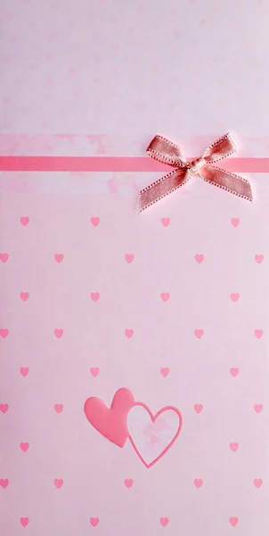 粉红色的蝴蝶结和心 — 图库照片