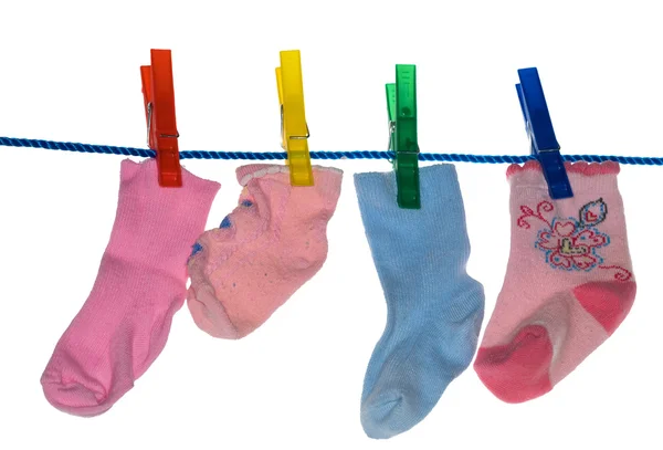 Stock image Clothes-pegs and socks