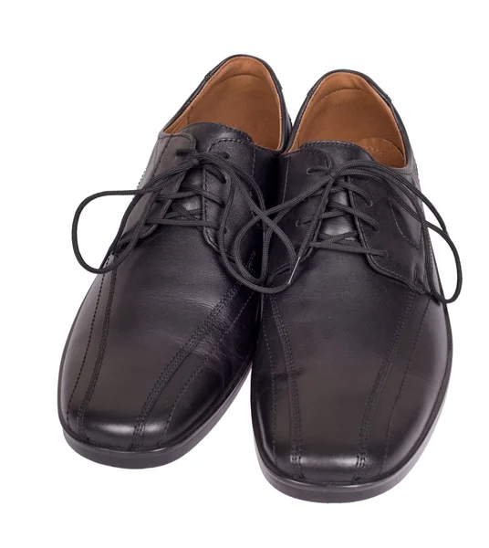 Zapatos negros en blanco — Foto de Stock