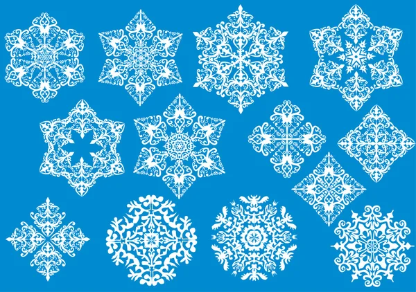 Colección de trece copos de nieve blancos — Vector de stock