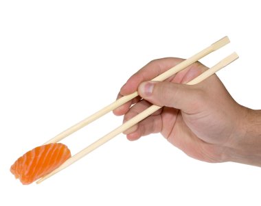 insan eli ile chopsticks ve sushi