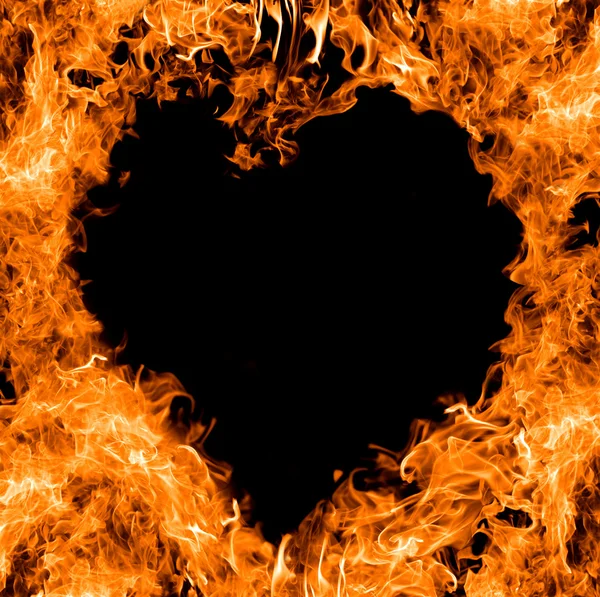Pomarańczowy serce kształt płomienia — Zdjęcie stockowe
