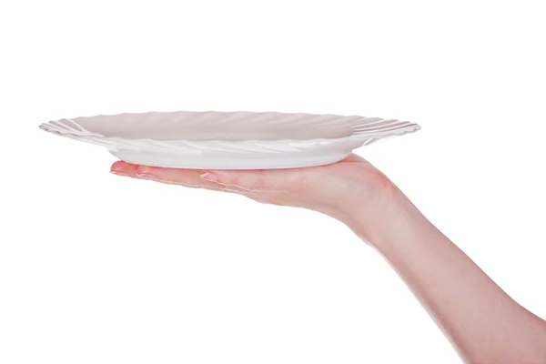 Mano con piastra bianca su bianco — Foto Stock