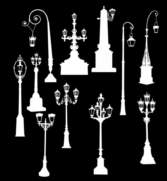 Одинадцять вуличних ліхтарів на чорному — стоковий вектор