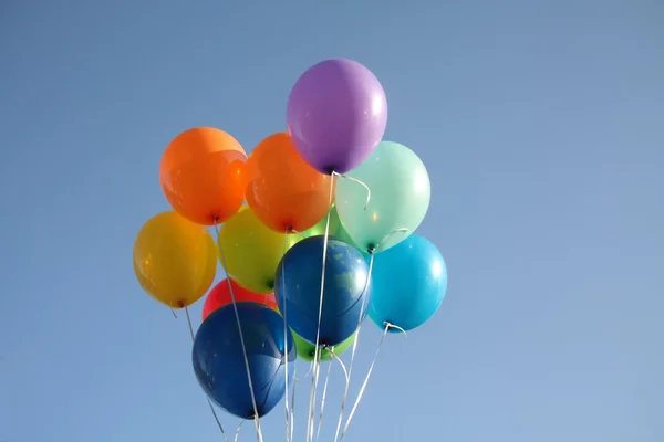 stock image Colorful balloons in a clear blue sky