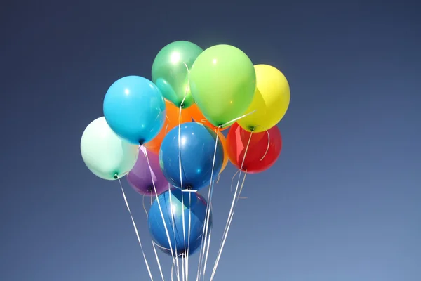 stock image Colorful balloons in a clear blue sky