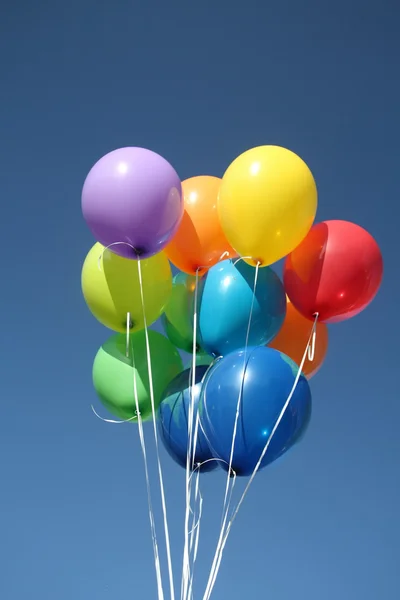 stock image Colorful balloons in a clear blue sky