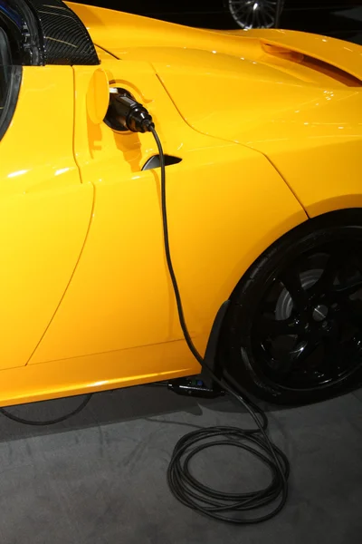 Battery charging of hybrid car — Stock Photo, Image