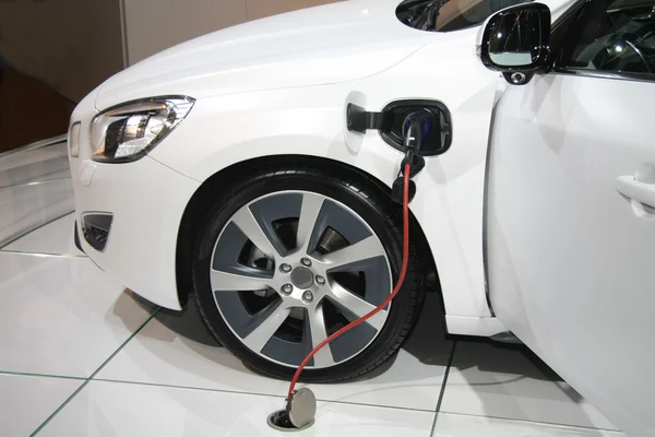White hybrid car on recharge — Stock Photo, Image