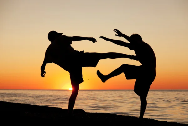 Lucha en una playa — Foto de Stock