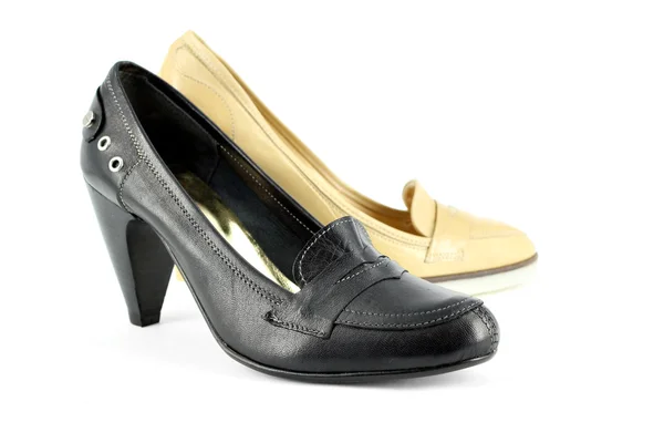 Kvinna svarta och bruna skor — Stockfoto
