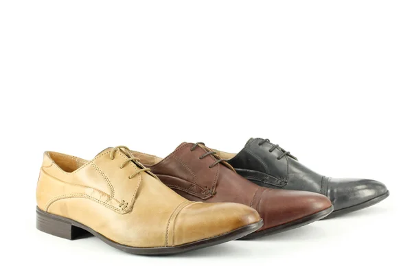 Oker bruine en zwarte man schoenen — Stockfoto