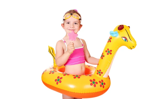 Little girl with ice cream and swimming rubber ready for beach — Stock Photo, Image