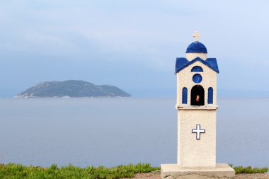 Orthodox little church shrine Neos Marmaras Sithonia Greece clipart