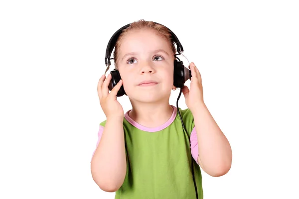 Müzik dinleyen küçük kız. — Stok fotoğraf