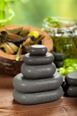 Spa treatment - black stones clipart