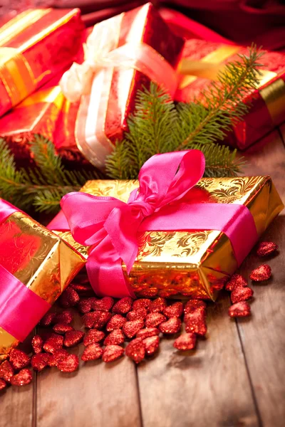 Xmas gifts and spruce tree — Stock Photo, Image