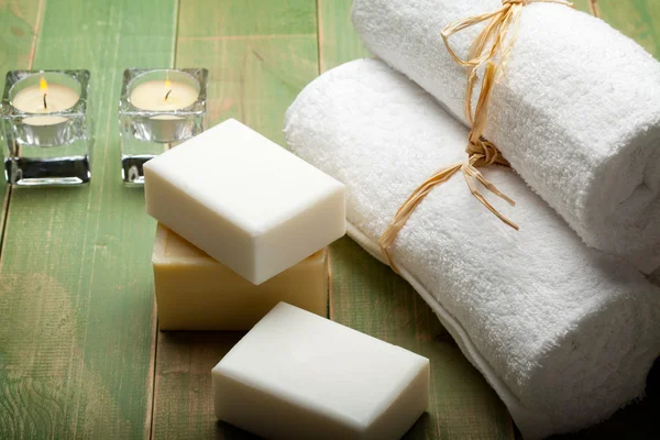 Soap and white towels — Stock Photo, Image