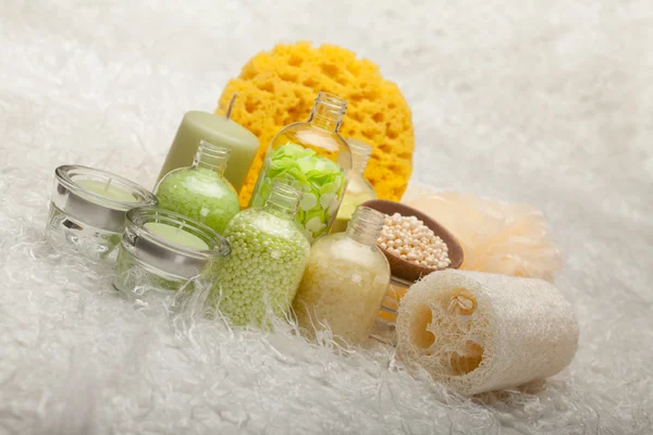Bath salt and massage sponge — Stock Photo, Image