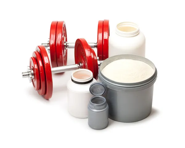 Suplementos dietéticos y pesas de acero — Foto de Stock