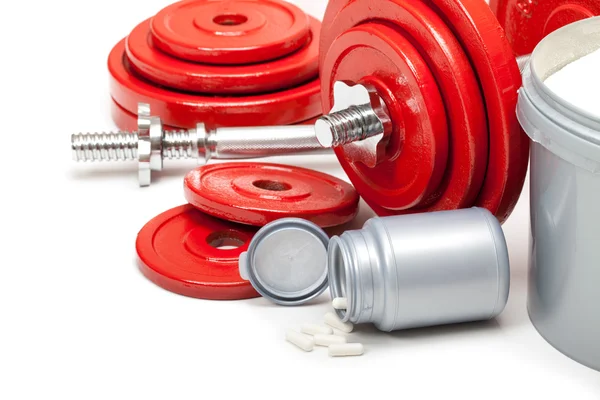 Body building - dumbbells and dietary supplements — Stock Photo, Image