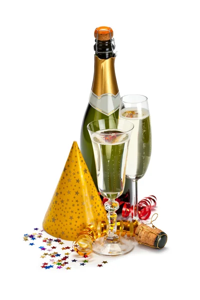 Champagner und Partymützen — Stockfoto